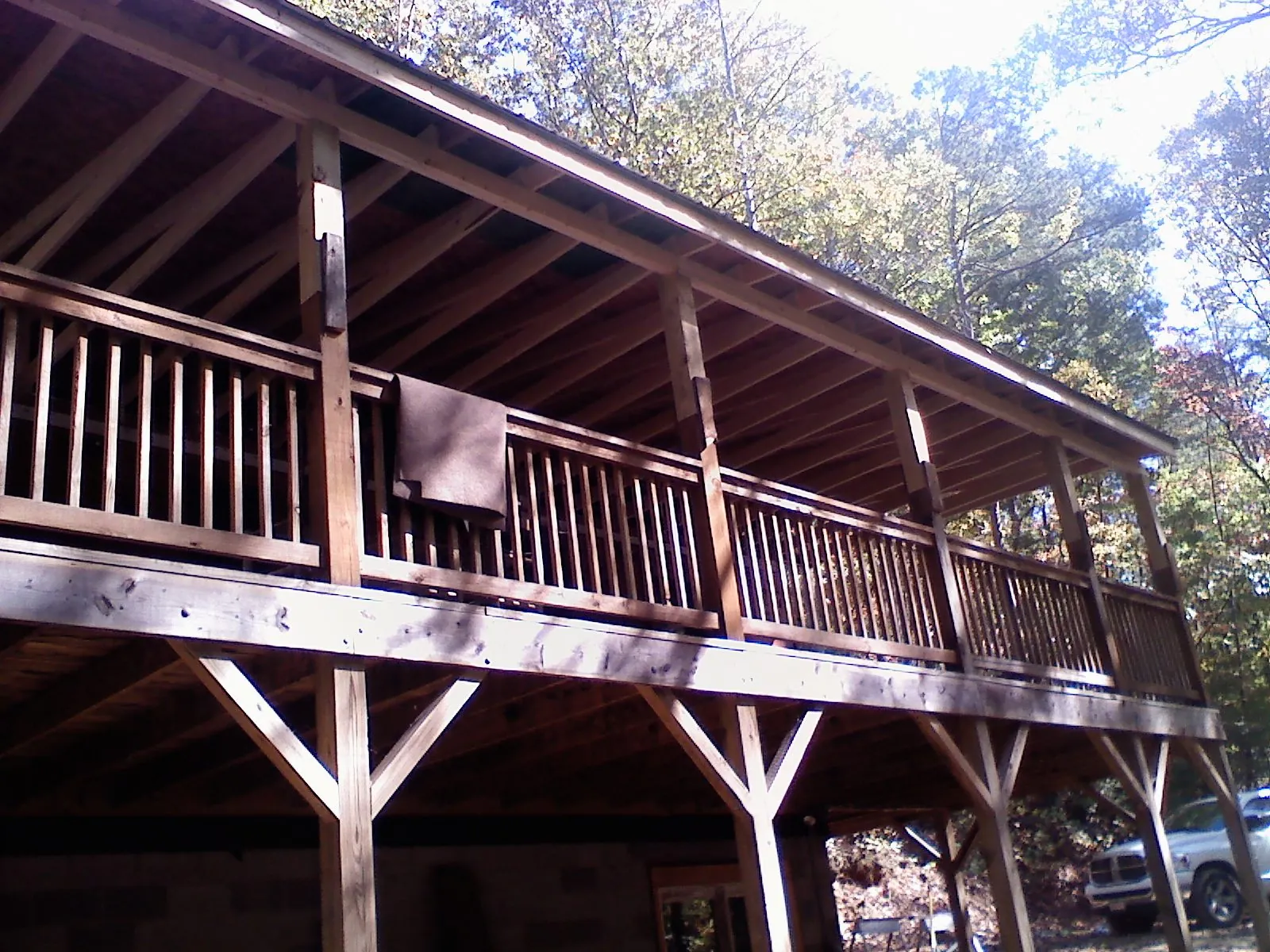 Timber framing under a new elevated porch and deck — Roof Leak Repair in Los Gatos by Roofing Brothers